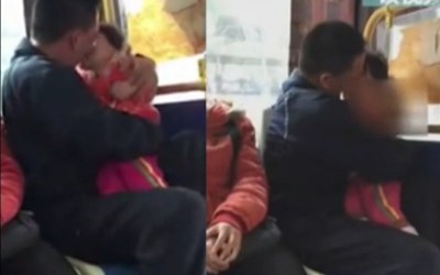 男子抱親生女兒公車上親吻長達3分鐘，過程忘我陶醉  誇張到路人全看傻眼了